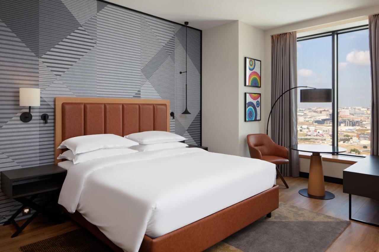 Chambre Lit King-Size Exécutive avec Accès au Salon Club - Vue sur Ville