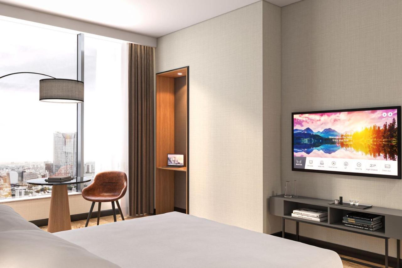 Chambre Lit King-Size Deluxe avec Canapé-Lit - Vue sur Ville