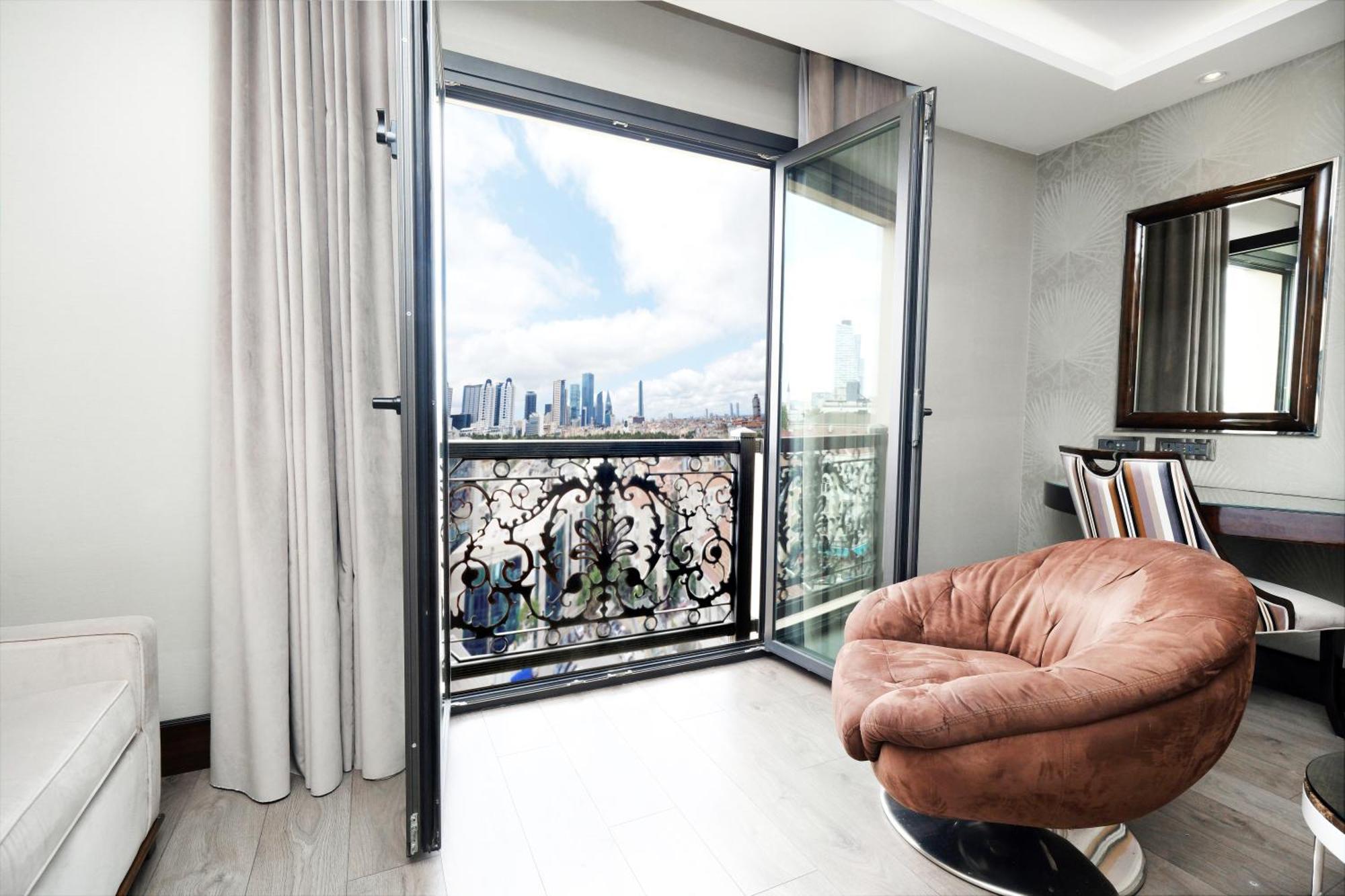 Chambre Lit King-Size Deluxe - Vue sur Ville