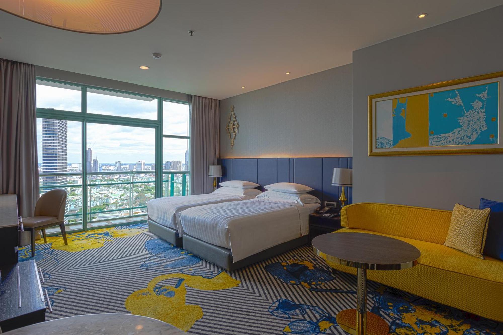 Grand Hébergement Lits Jumeaux Club Deluxe - Vue sur Rivière