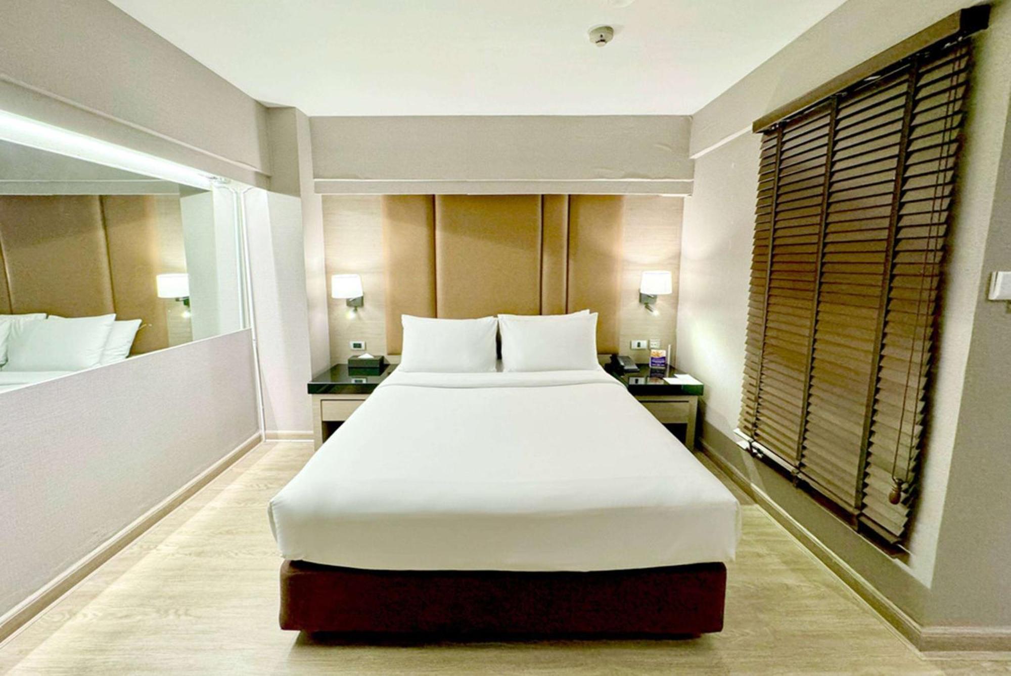 Chambre Lit Queen-Size Premier Sans Fenêtre - Non-Fumeurs
