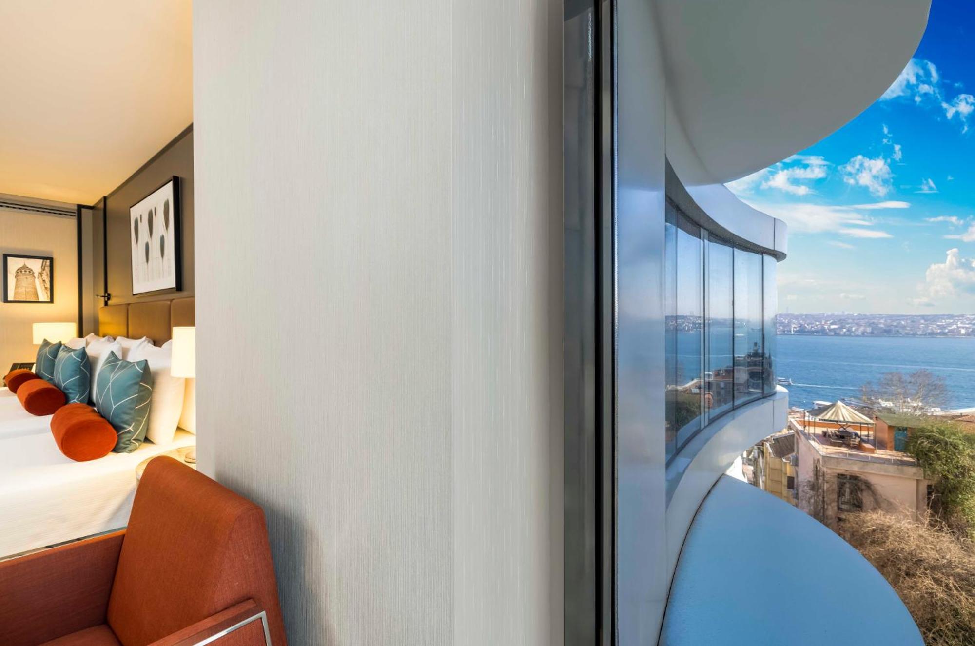 Chambre Triple Deluxe - Vue Partielle sur Mer