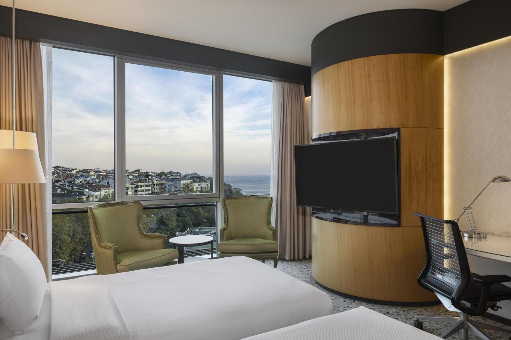 Chambre Lits Jumeaux Deluxe - Vue Partielle Mer
