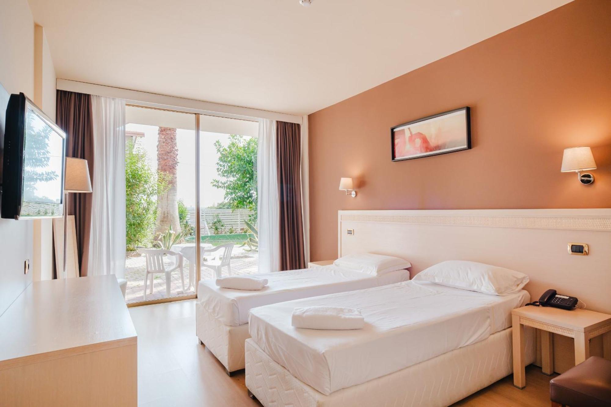 Chambre Double ou Lits Jumeaux - Vue sur Jardin